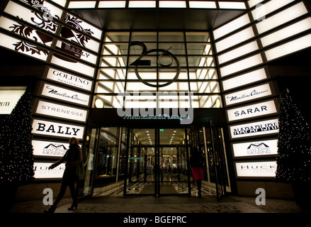 Evening view of exterior of Quartier 206 upmarket shopping mall on Friedrichstrasse in Mitte Berlin 2009 Stock Photo