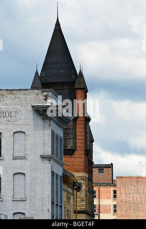 Old buildings and the abandoned Pythian Castle along Jefferson Ave in Toledo, Ohio Stock Photo