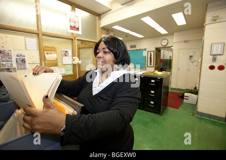 Detroit, Michigan - A Detroit Public Schools secretary on the job at Malcolm X Academy. Stock Photo