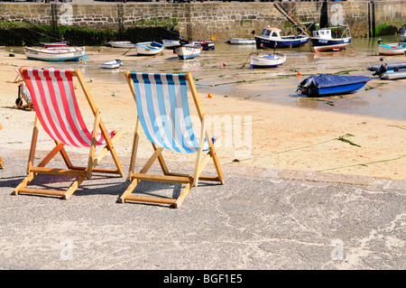 Deckchairs at the beach, St Ives, Cornwall, England, UK Stock Photo