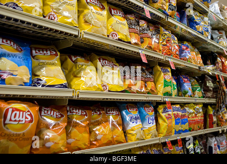 Potato chips on display in a grocery store.  Stock Photo