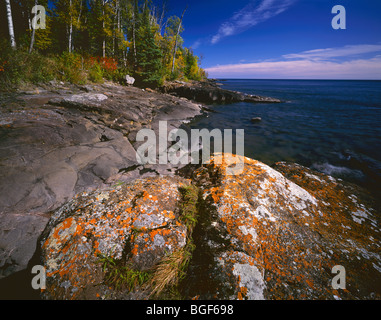 MINNESOTA - Lichen covered rocks along the shore of Lake Superior near Hovland. Stock Photo