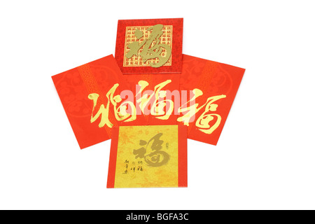 Chinese New year red packets on white background Stock Photo