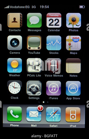 screen of Apple iPhone showing applications on home page with one new mail message Stock Photo