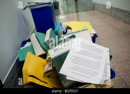 20 May 2009 – Washington, D.C. – A discarded copy of the Federal Budget still in its wrapping sits in a recycle bin outside of an office in the Dirksen Senate Office Building. Stock Photo