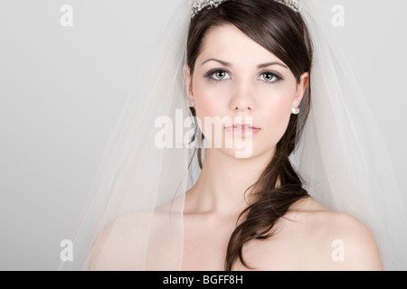 Striking Portrait Shot of a Beautiful Teenage Bride Stock Photo