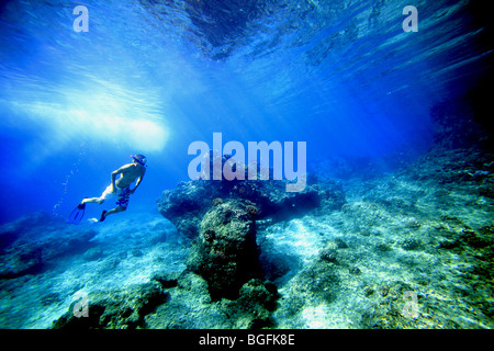 Snorkeling in the clear waters off Sipora Island. Mentawai Islands, Sumatra, Indonesia, Southeast Asia, Asia Stock Photo