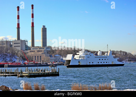 Car and passenger ferry from Bridgeport CT approaches dock at Port Jefferson, Long Island, NY Stock Photo