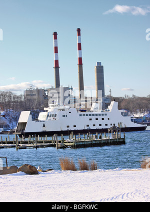 Car and passenger ferry from Bridgeport CT approaches dock at Port Jefferson, Long Island, NY Stock Photo