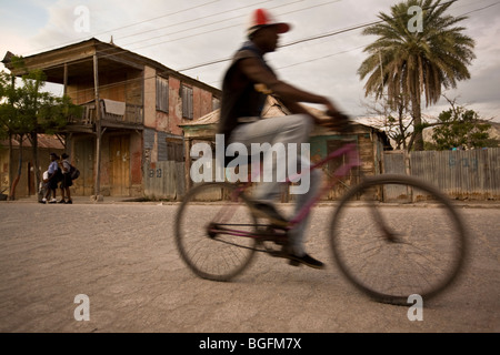 Man on a bicycle in Gonaives, Artibonite Department, Haiti Stock Photo