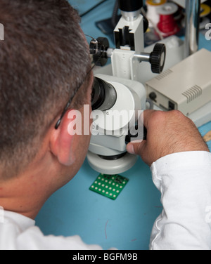 Male scientist using microscope, close up Stock Photo - Alamy