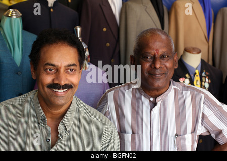 Portrait of friendly tailors of Pagoda Street. Chinatown, Singapore, Southeast Asia, Asia Stock Photo