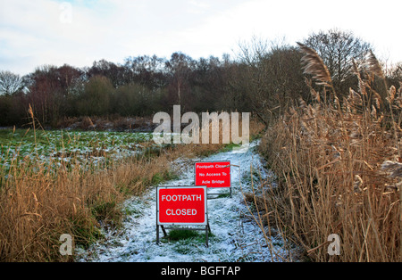Notices informing of temporary closure of public footpath at Upton, near Acle, Norfolk, United Kingdom. Stock Photo