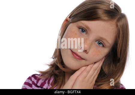 Little girl's portrait isolated against a white background Stock Photo