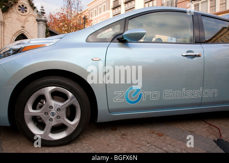 Side view of new Nissan Leaf. This fully electric car has no tailpipe since there are no exhaust emissions. Stock Photo