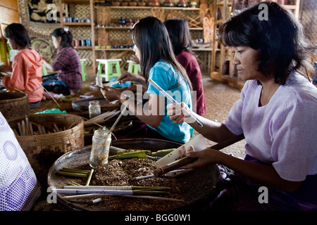 Women working in a root cigars factory. Indein village. Inle Lake. Myanmar. Stock Photo