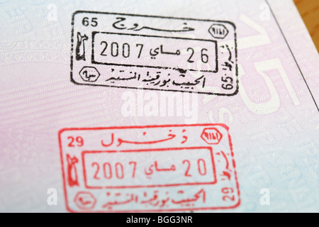 eu irish passport stamped with entry and exit visas with arabic writing for republic of tunisia Stock Photo