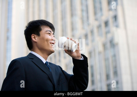 Man with coffee and documents Stock Photo
