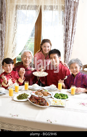 Family having Chinese New Year dinner Stock Photo