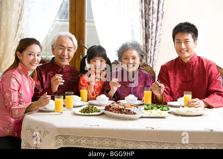 Family having Chinese New Year dinner Stock Photo