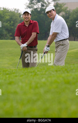 Two Golfers on the Course Stock Photo