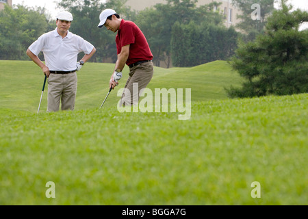 Two Golfers on the Course Stock Photo