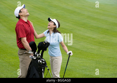 Portrait of Two Golfers on the Course Stock Photo