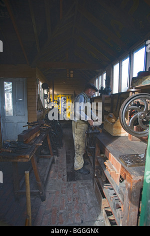 Beamish museum, craftsman at work in old shed, The Colliery, 1913, Durham, England, October, 2009 Stock Photo