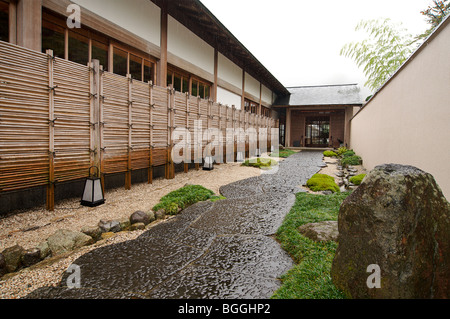 Entrance path leading to Gora Kadan ryokan,  Japanese inn. Hakone, Japan Stock Photo