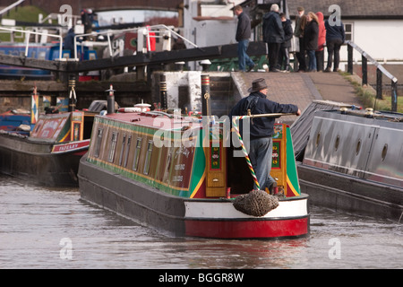 Canal boat waiting to pass through three locks on the Grand Union Canal UK