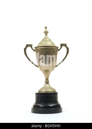 An old tarnished trophy isolated against a white background Stock Photo