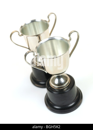 An old tarnished trophy isolated against a white background Stock Photo