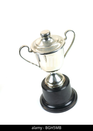 An old tarnished trophy isolated against a white background Stock Photo