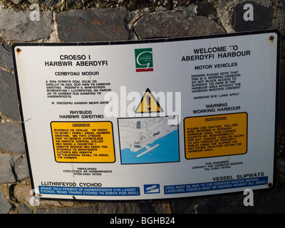 A sign on the wall of the harbor in Aberdovey (Aberdyfi), Gwynedd Mid Wales UK Stock Photo