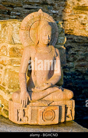 Seated Buddha Icon Statue on Stromness Jetty Waterfront by the harbour.  SCO 5821 Stock Photo