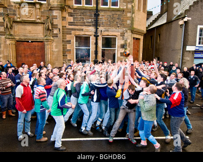 The Orkney Ba Game held in the streets each Christmas day in Kirkwall Mainland Orkney.