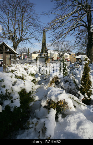 Village of Holt, Wales. Picturesque view of Holt village centre on a cold, snowy winter’s day. Stock Photo