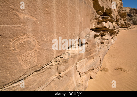 View along sandy wadi floor showing rock-Art of Ibex in the Eastern Desert of Egypt. Stock Photo