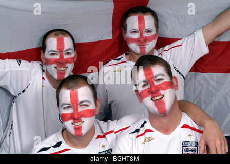 England football fans with faces painted Stock Photo