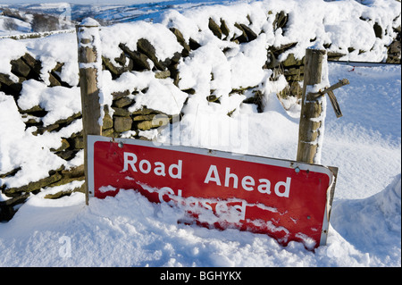 Road Ahead Closed sign on the A6024 outside Holme in the Holme Valley in Jan 2010, near Holmfirth, West Yorkshire, England Stock Photo