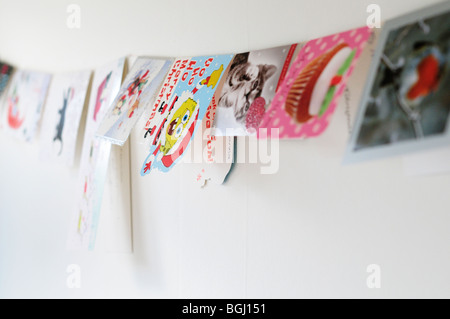 Christmas cards on a string Stock Photo