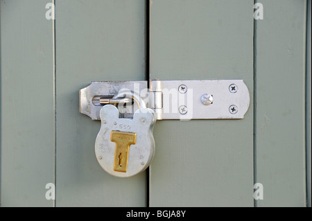 Padlock on Garage Door, UK Stock Photo