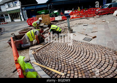 Modern cobblestone being laid Stock Photo