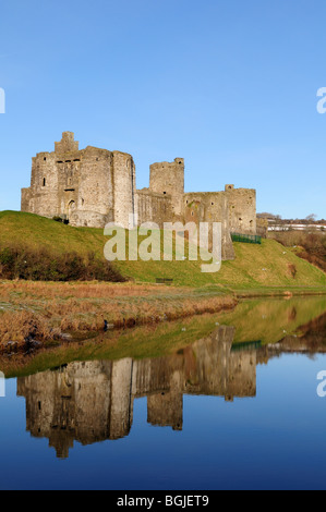 Kidwelly Castle reflected in the Gwendraeth River Carmarthenshire Wales Cymru UK GB Stock Photo