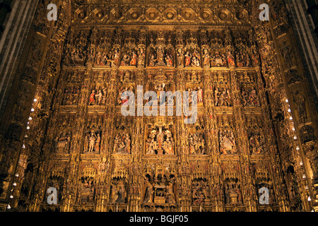 Carved and painted retablo, Capilla Mayor, Seville Cathedral, Spain Stock Photo