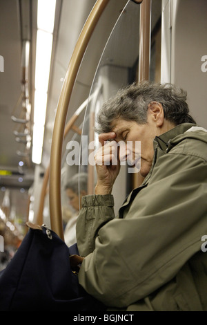 hangover, anxiety woman, serious sad alone suicidal schizophrenia schizophrenic trauma traumatic 50 60 70 50s 60s 70s yo year years old worried woman Stock Photo