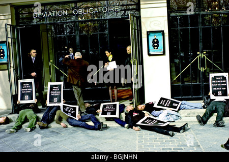 Paris, FRANCE - AIDS Activists Act Up Paris Protest Against Abbott Pharmaceuticals Lab. for their Raising AIDS Drugs Price, HIV gay community, act up protest silence death, drug pricing, flashmob LAYING Stock Photo