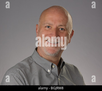 Smiling middle-aged man with goatee. Stock Photo