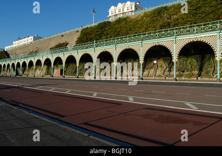 Wrought iron covered promenade along seafront of Madeira Drive, Brighton, East Sussex, England Stock Photo