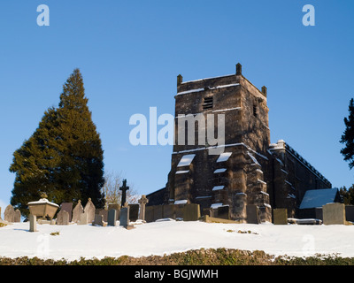 The Parish Church of St Mary in Tissington Village after snowfall, in the Peak District Derbyshire England UK Stock Photo